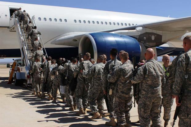 Deploying US Army soldiers on commercial airlift Deploying US Army soldiers on commercial airlift